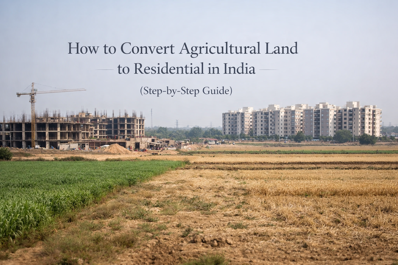 Agricultural land transitioning into residential development in India with construction site and apartment buildings in background representing land conversion process.